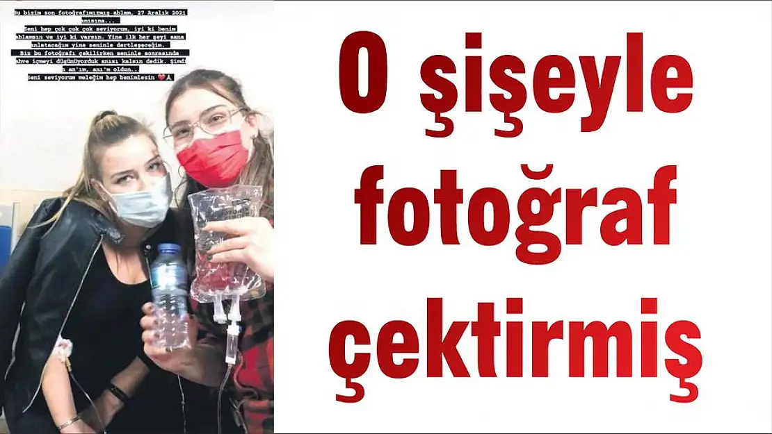 O şişeyle fotoğraf çektirmiş