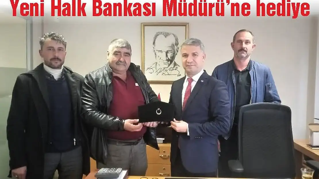 Yeni Halk Bankası Müdürü'ne hediye