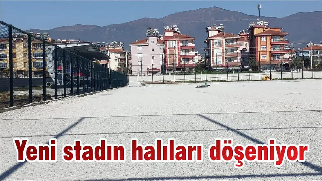 Yeni stadın halıları döşeniyor