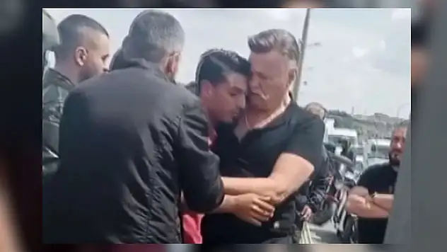 Nuri Alço intihar etmek üzere olan genci kurtardı