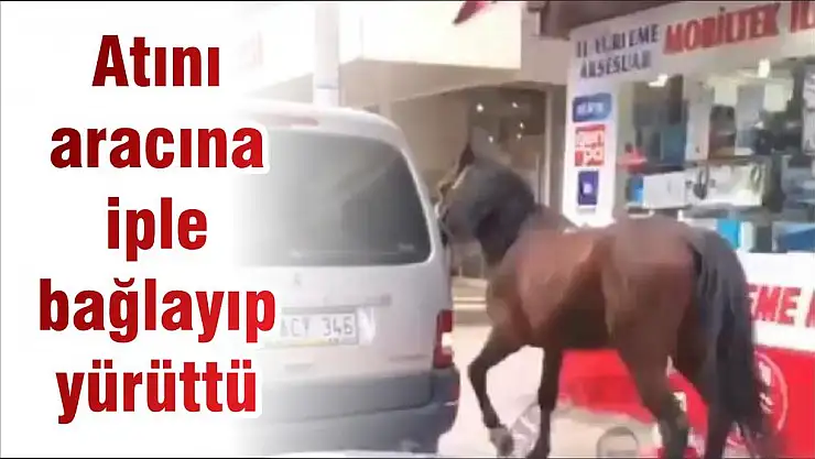 Atını aracına iple bağlayıp yürüttü