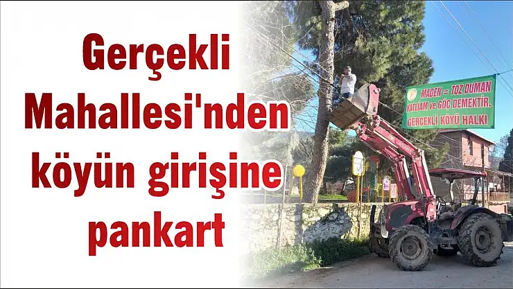 Gerçekli Mahallesi'nden köyün girişine pankart